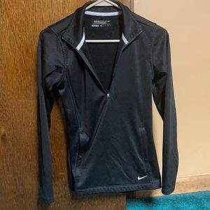 Nike women’s gold shirt